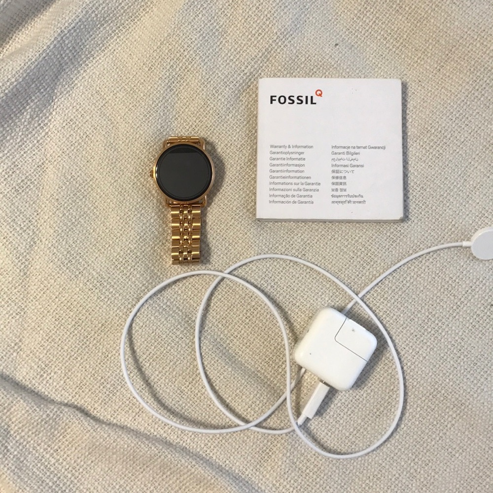 Fossil smart watch with instructions and charger